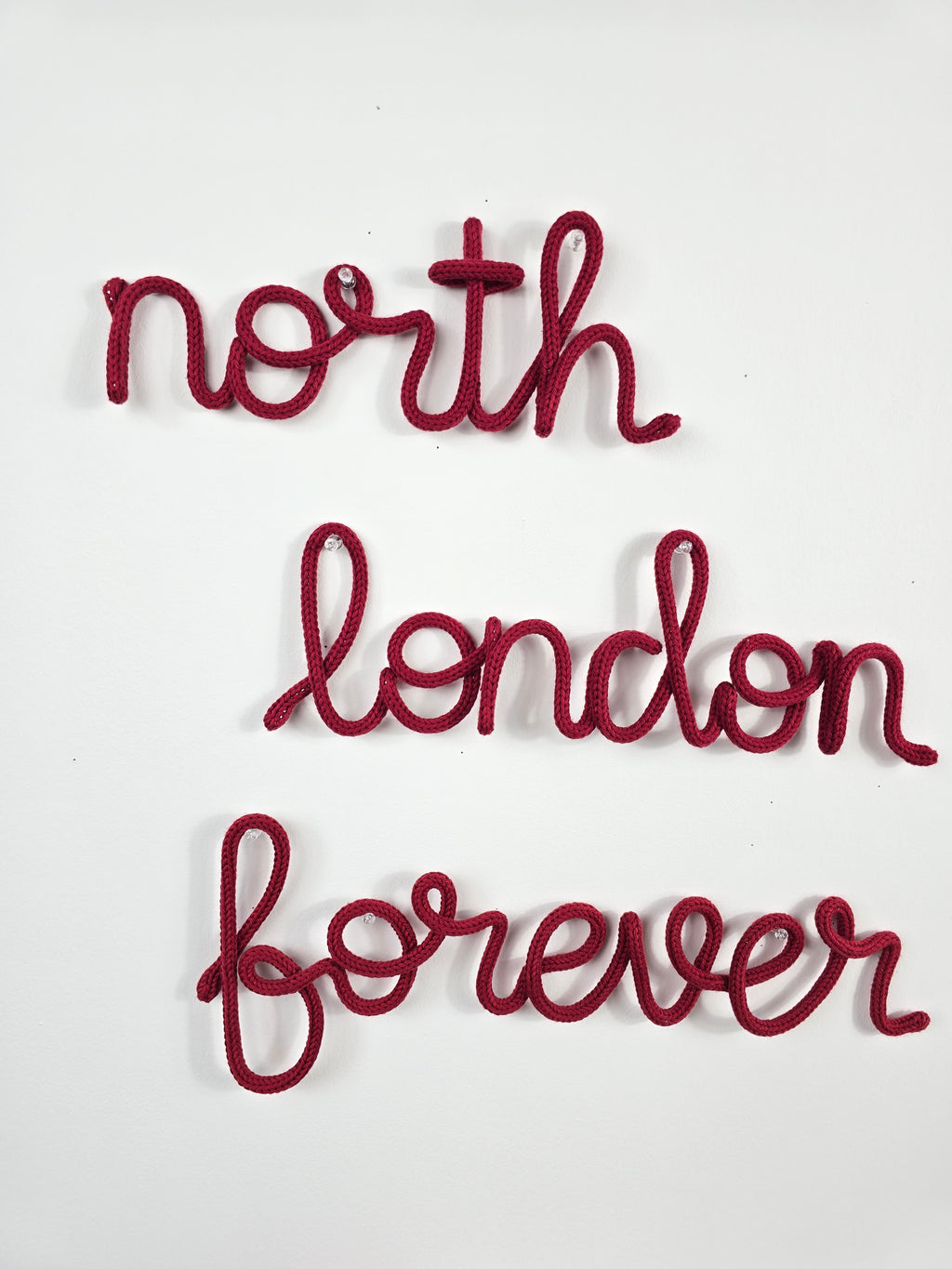 Handmade north london forever knitted wire wall sign in burgundy
