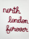Handmade north london forever knitted wire wall sign in burgundy
