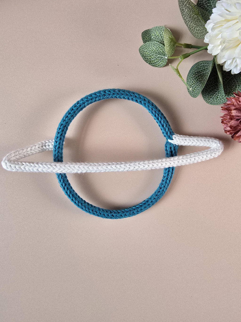 Blue knitted wire Saturn planet wall decor with white ring