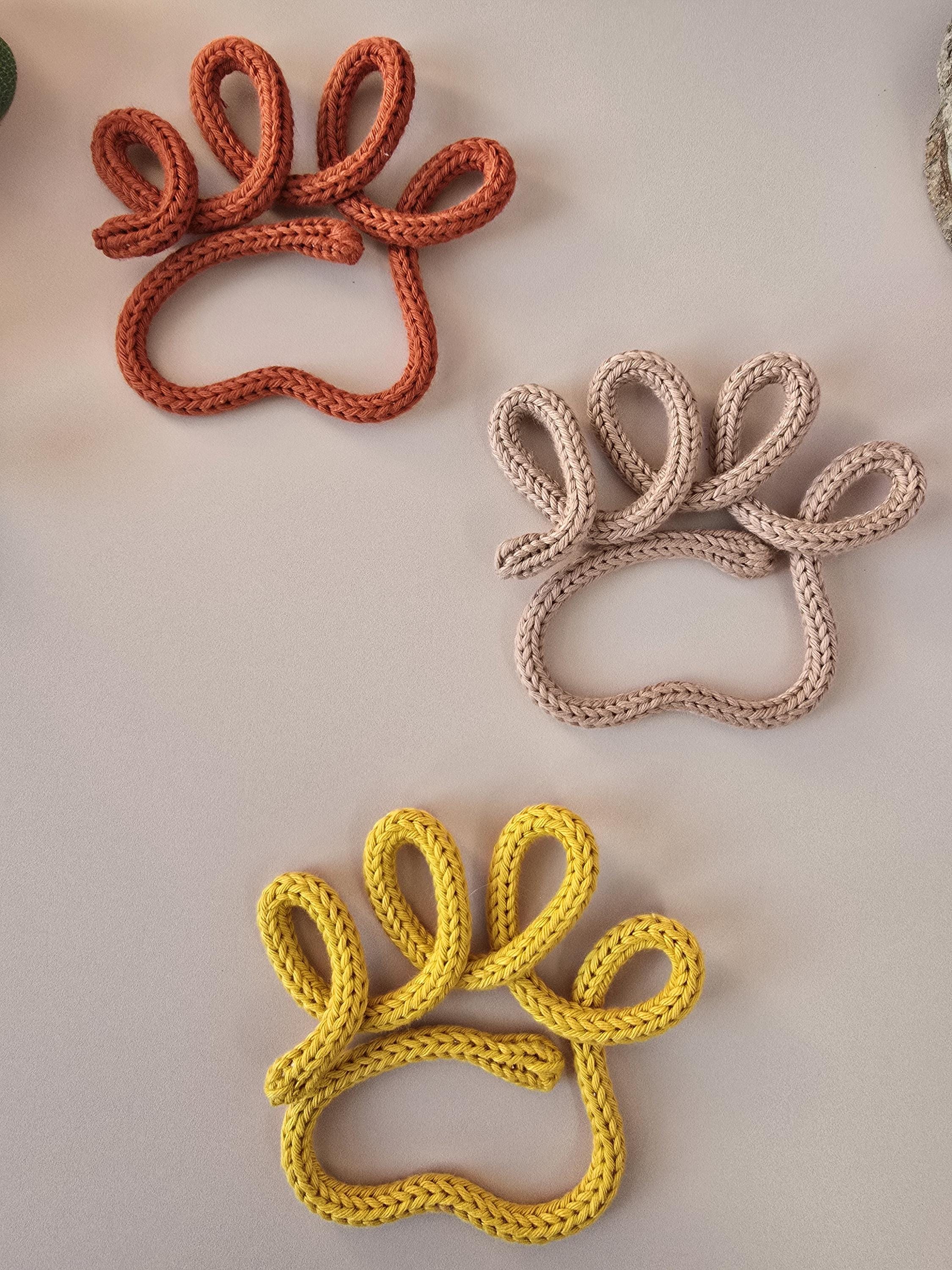 Brown knitted wire dog paw decor handmade from cotton yarn