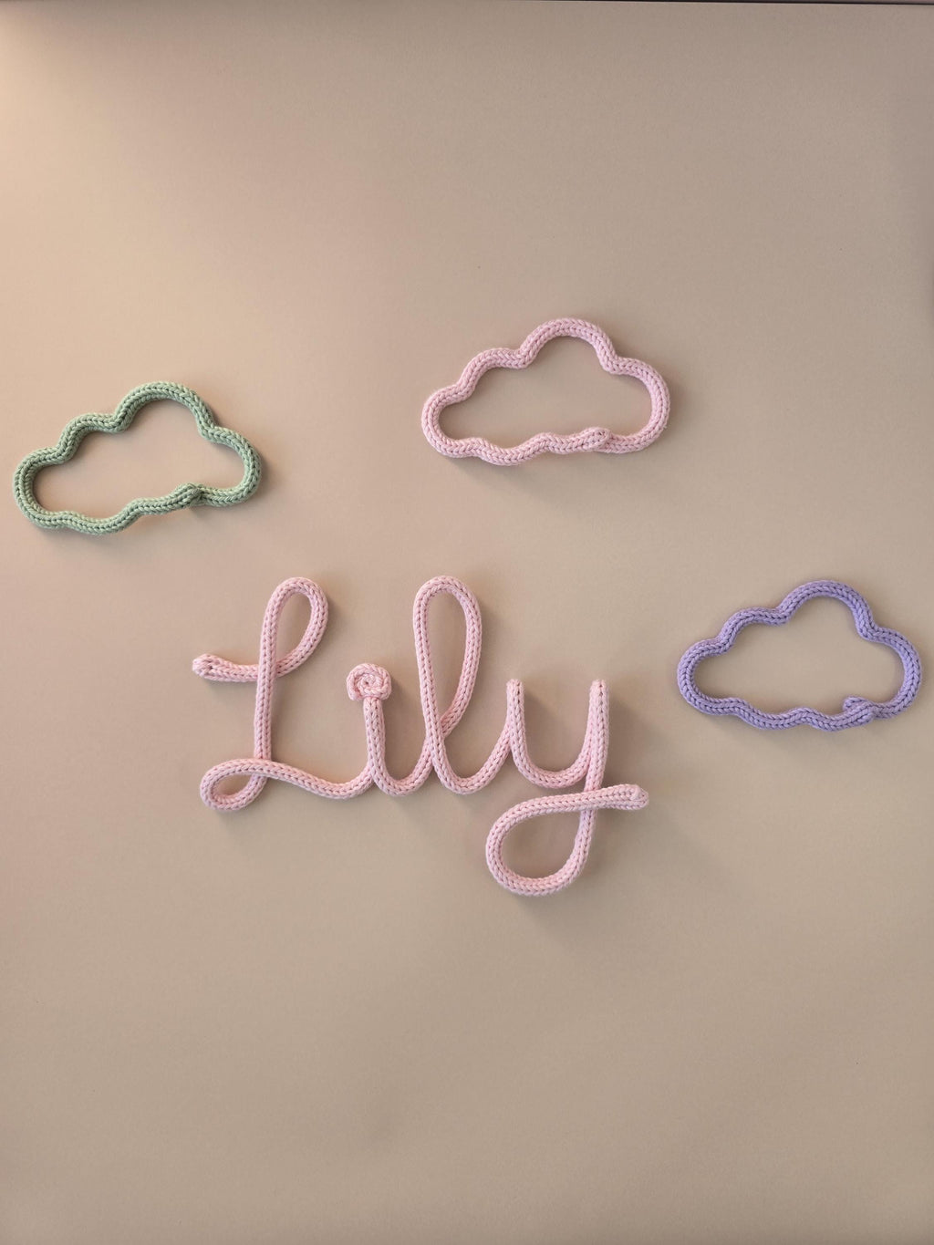 Cloud wall decor styled for a nursery or child’s room