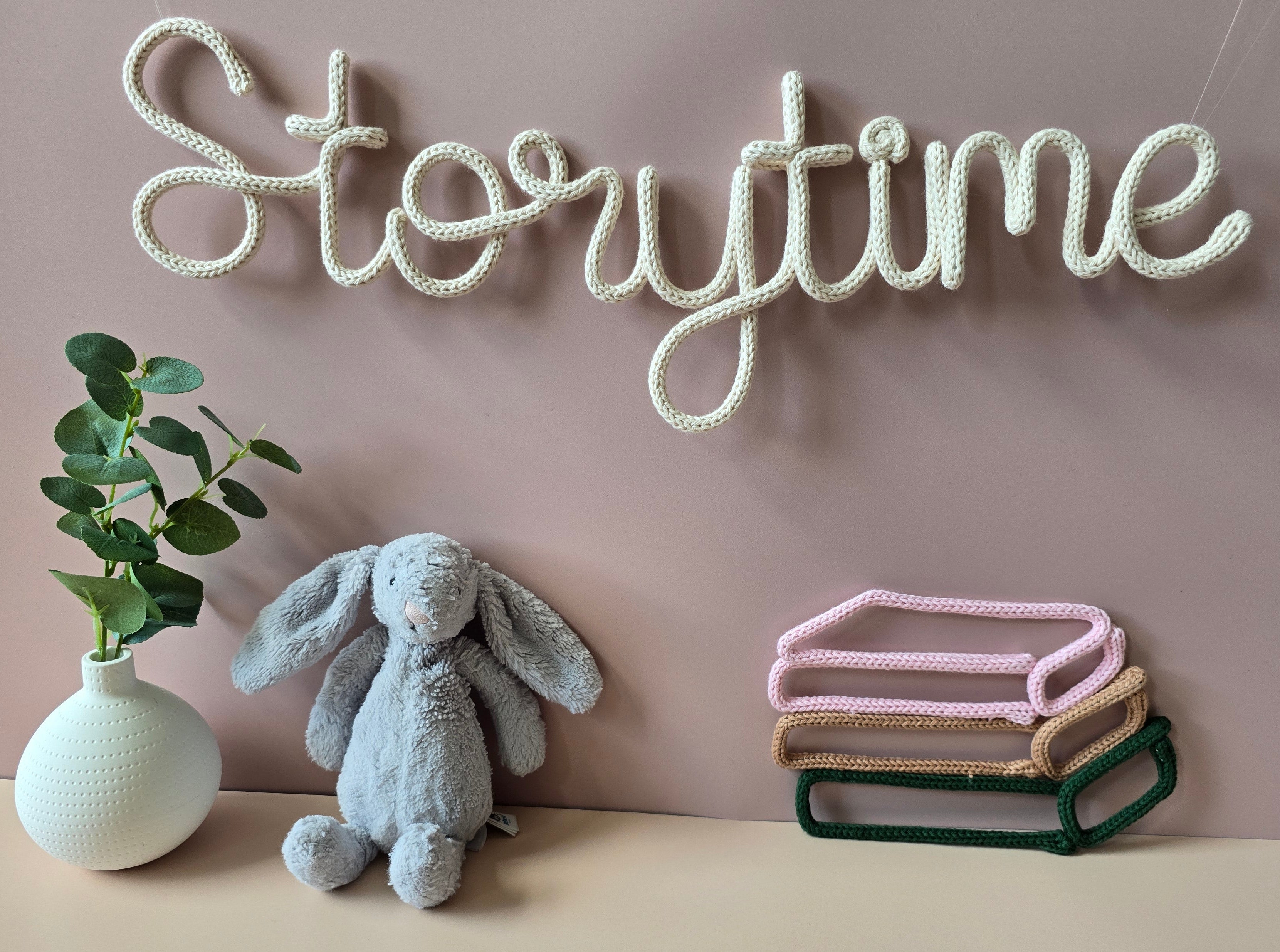 Handmade knitted wire book stack available in custom colour combinations
