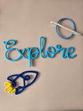handmade Explore knitted wire sign with rocket and planet decoration