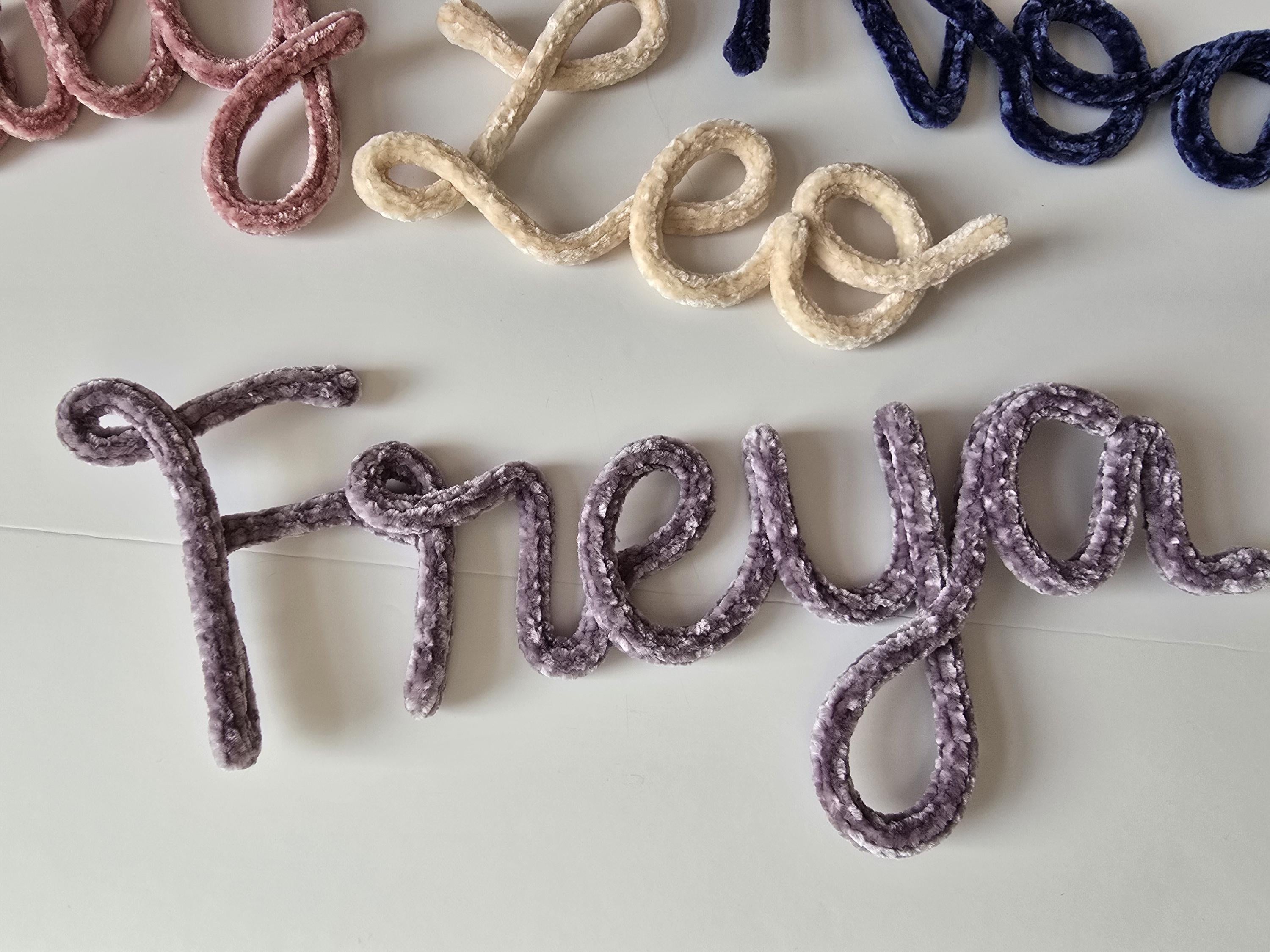 Personalised velvet knitted wire name sign reading Freya
