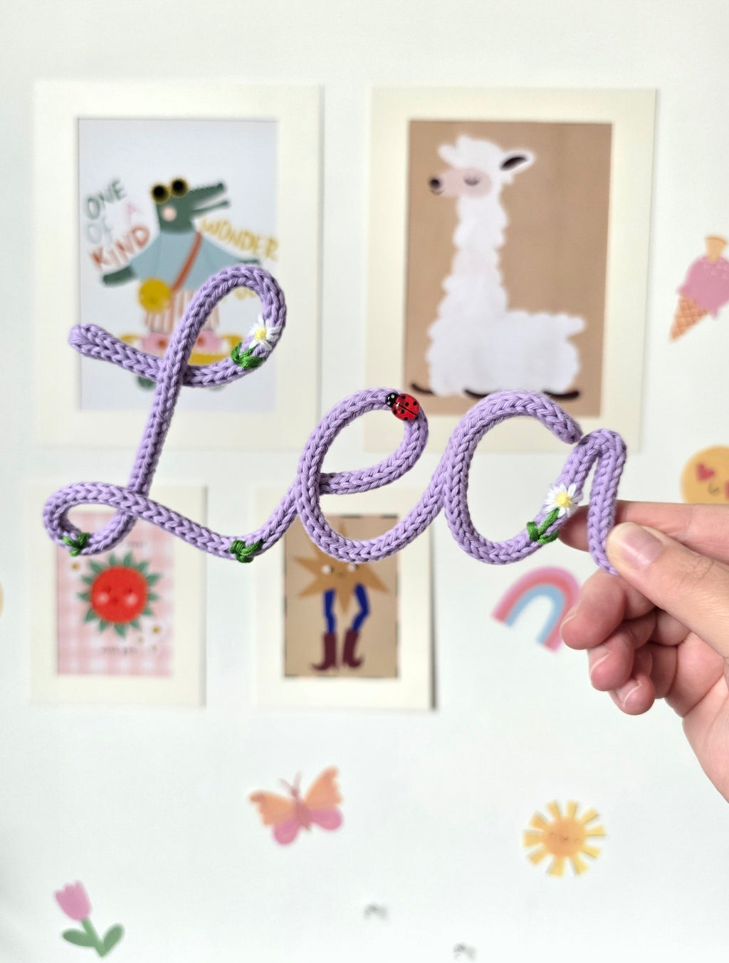 Lilac Lea embroidered knitted wire name sign showing the handmade embroidered details.