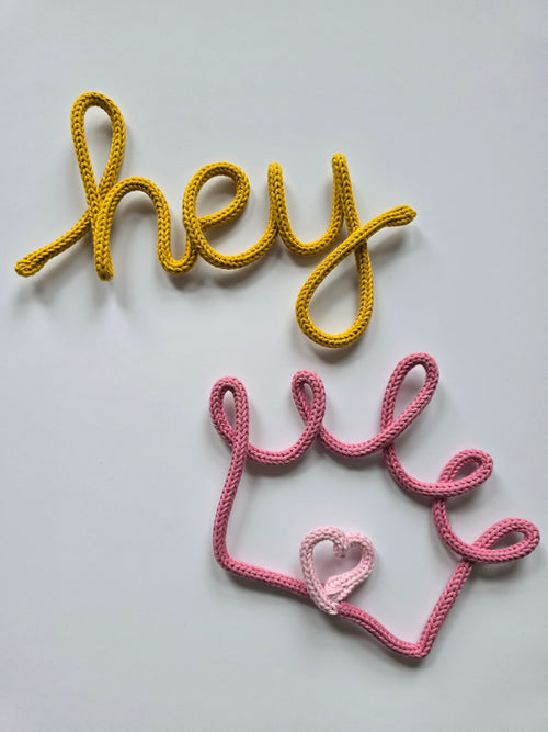 Handmade Hey knitted wire sign with a pink crown sign