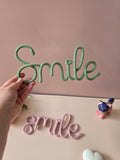 Handmade Smile knitted wire sign in sage
