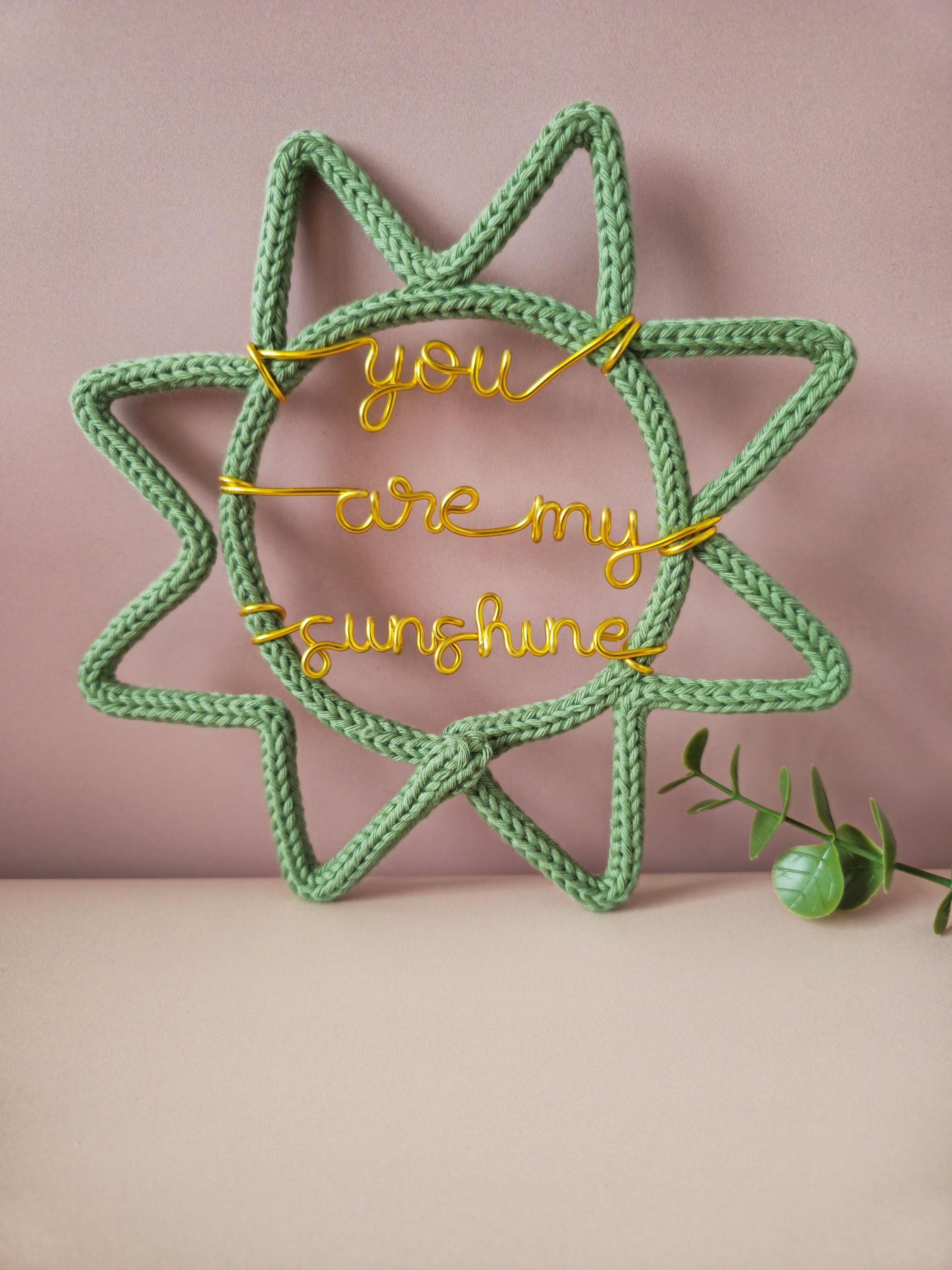 Handmade You Are My Sunshine nursery sign made from cotton yarn and wire