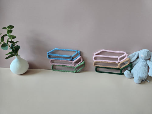 Handmade knitted wire book stack wall decor in two colour combinations