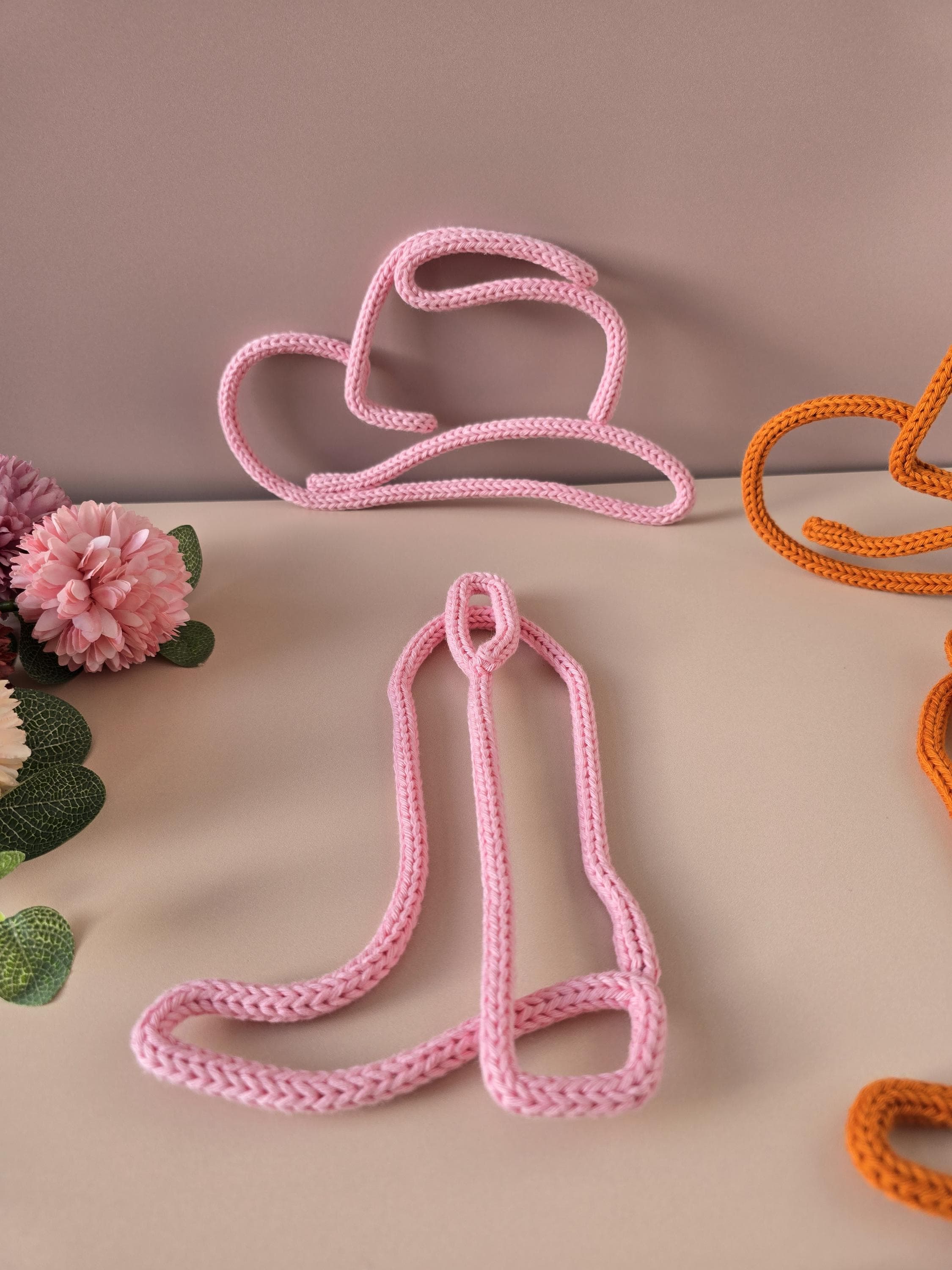 Handmade knitted wire cowboy boot and hat decor in soft cotton yarn