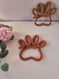 Handmade knitted wire dog paw decor in two colours