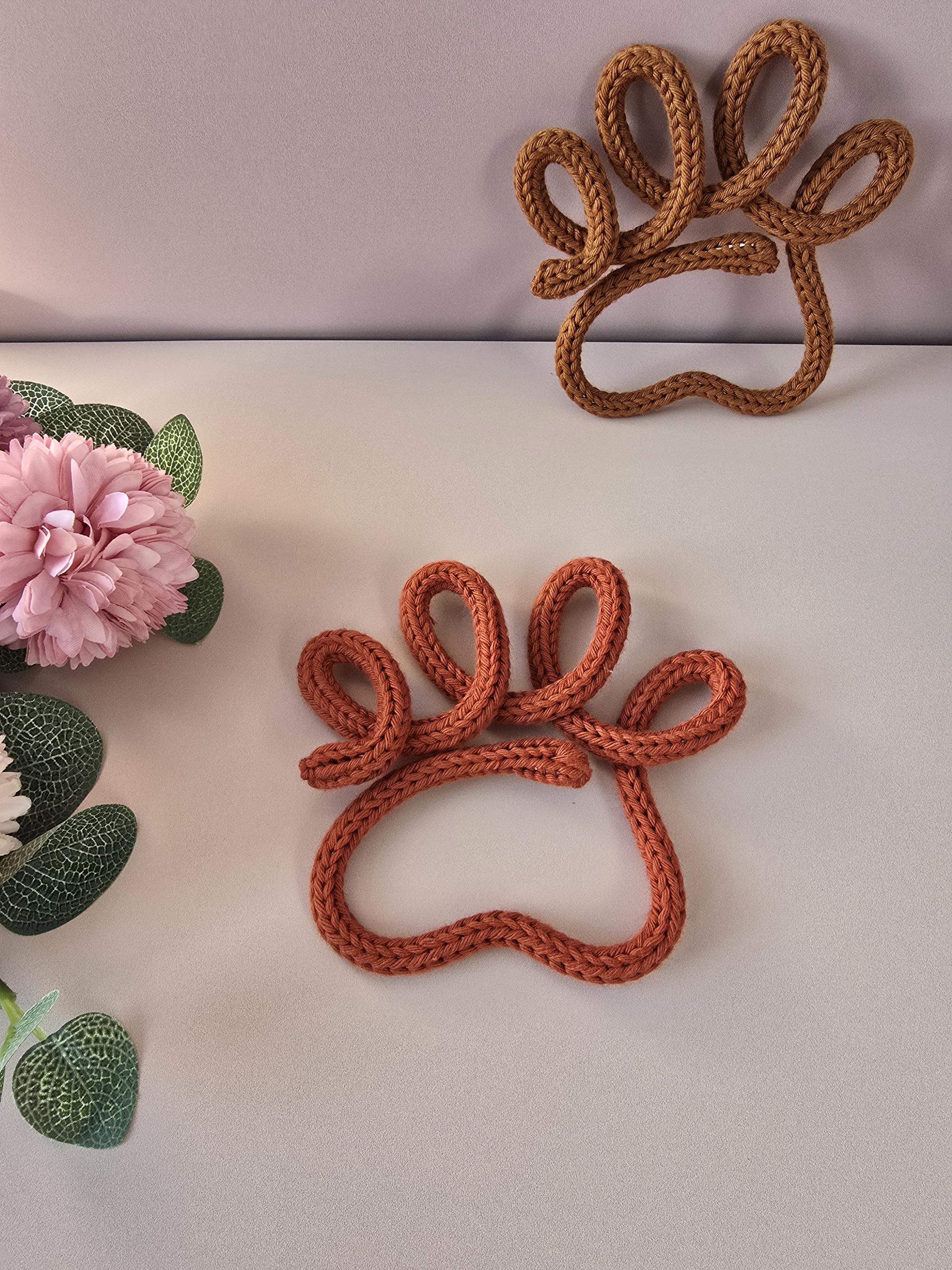 Handmade knitted wire dog paw decor in two colours