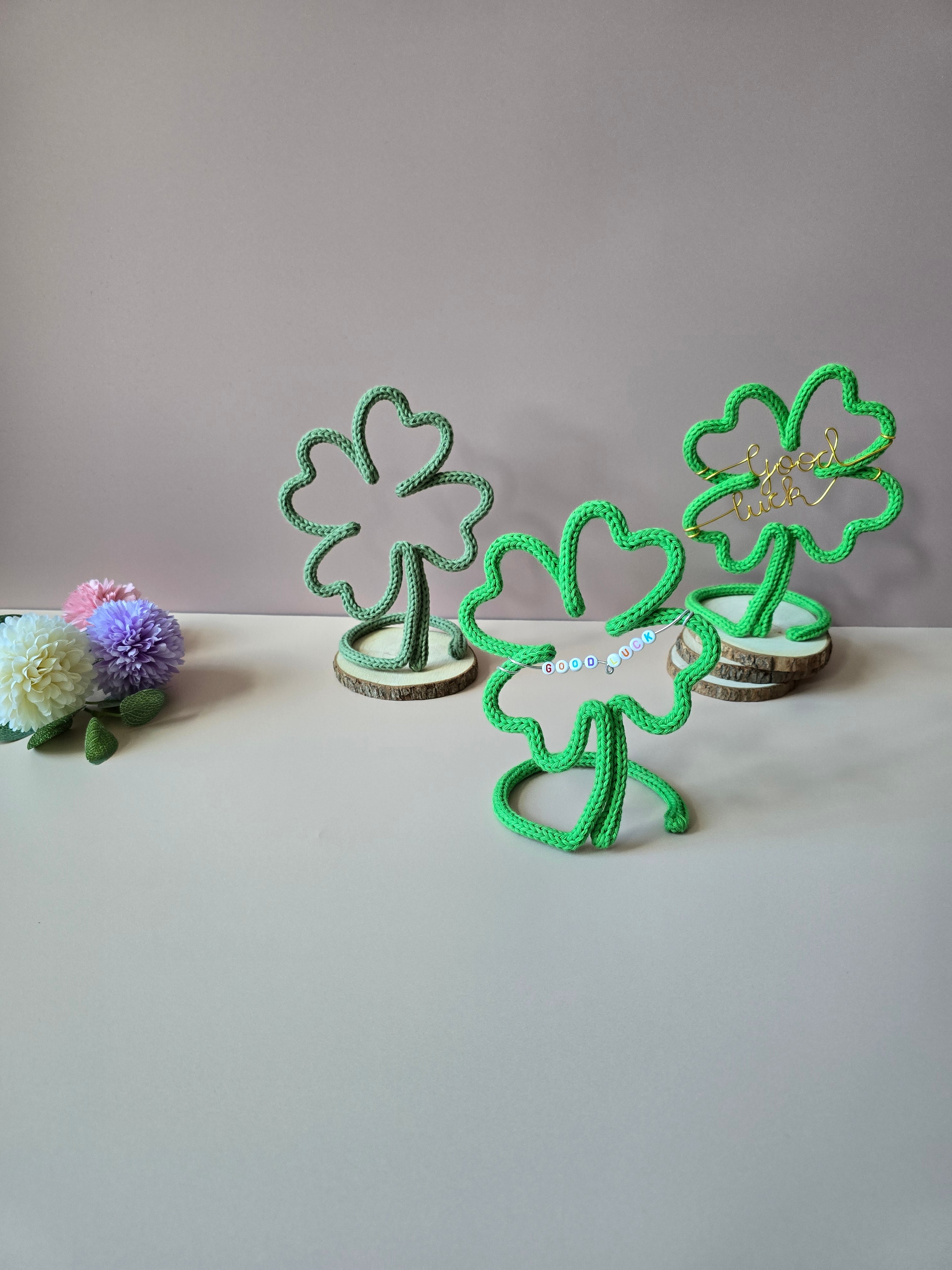 Knitted wire four leaf clover decorations with Good Luck wording and plain clover option