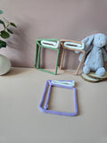Handmade knitted wire single book wall decor for a reading corner