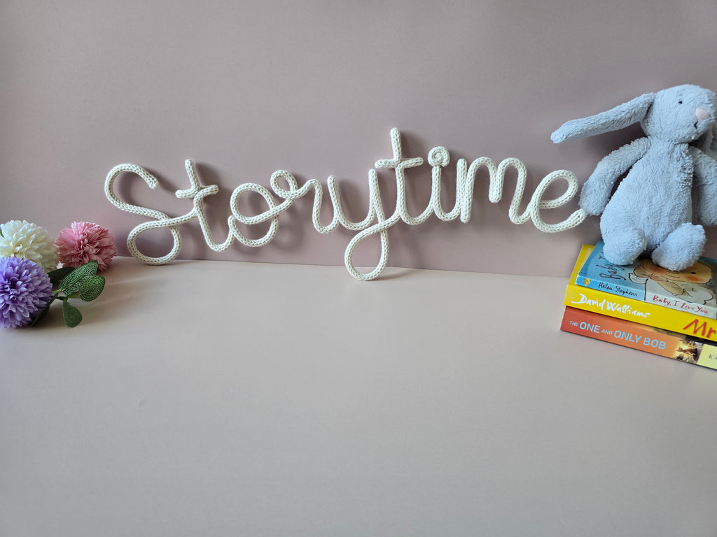 Handmade knitted wire Storytime wall sign for a reading corner