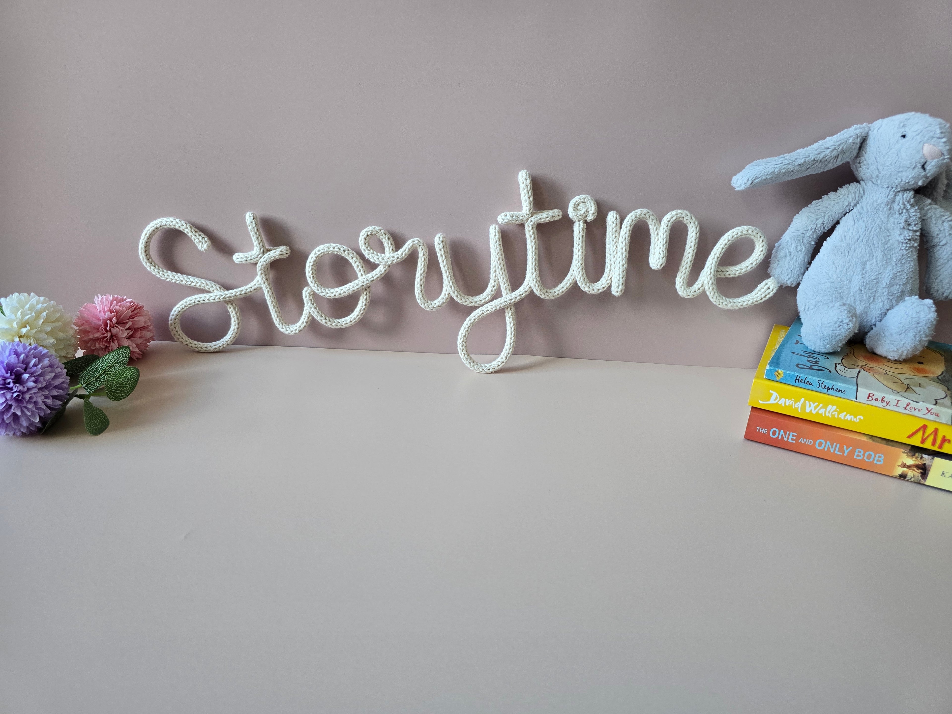 Handmade knitted wire Storytime wall sign for a reading corner