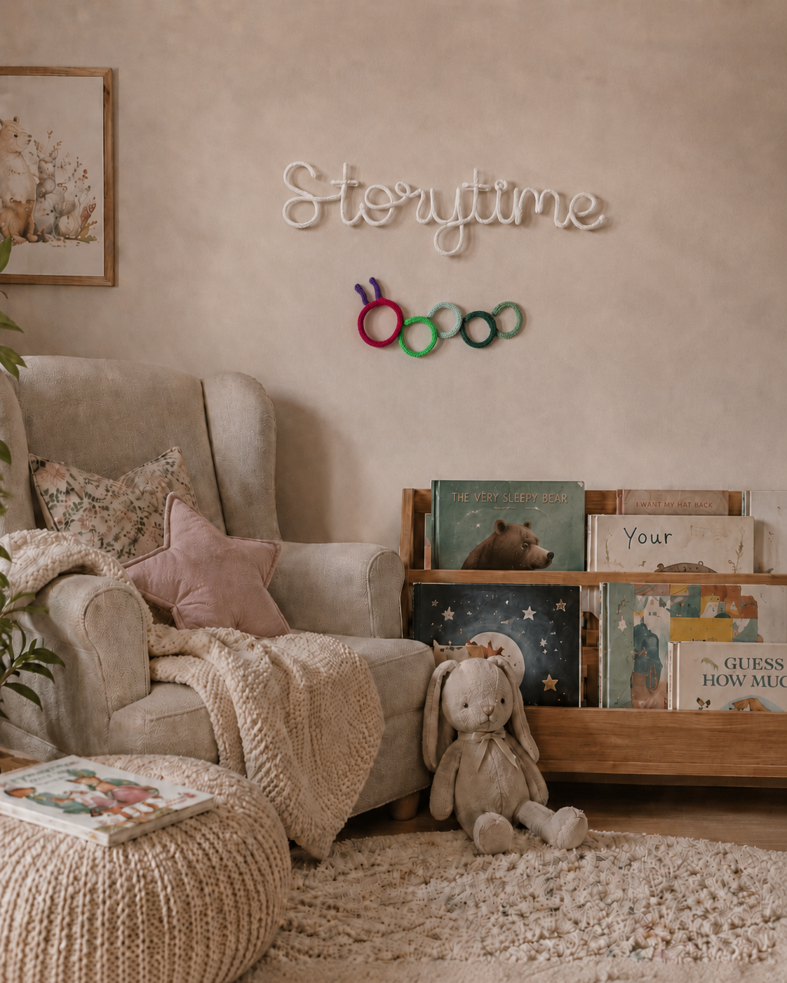 Knitted wire Storytime and hungry caterpillar in a nursery reading corner.