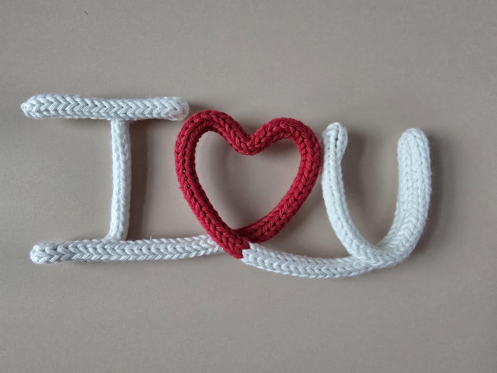Multi-colour knitted wire I Love You sign with heart in a different colour