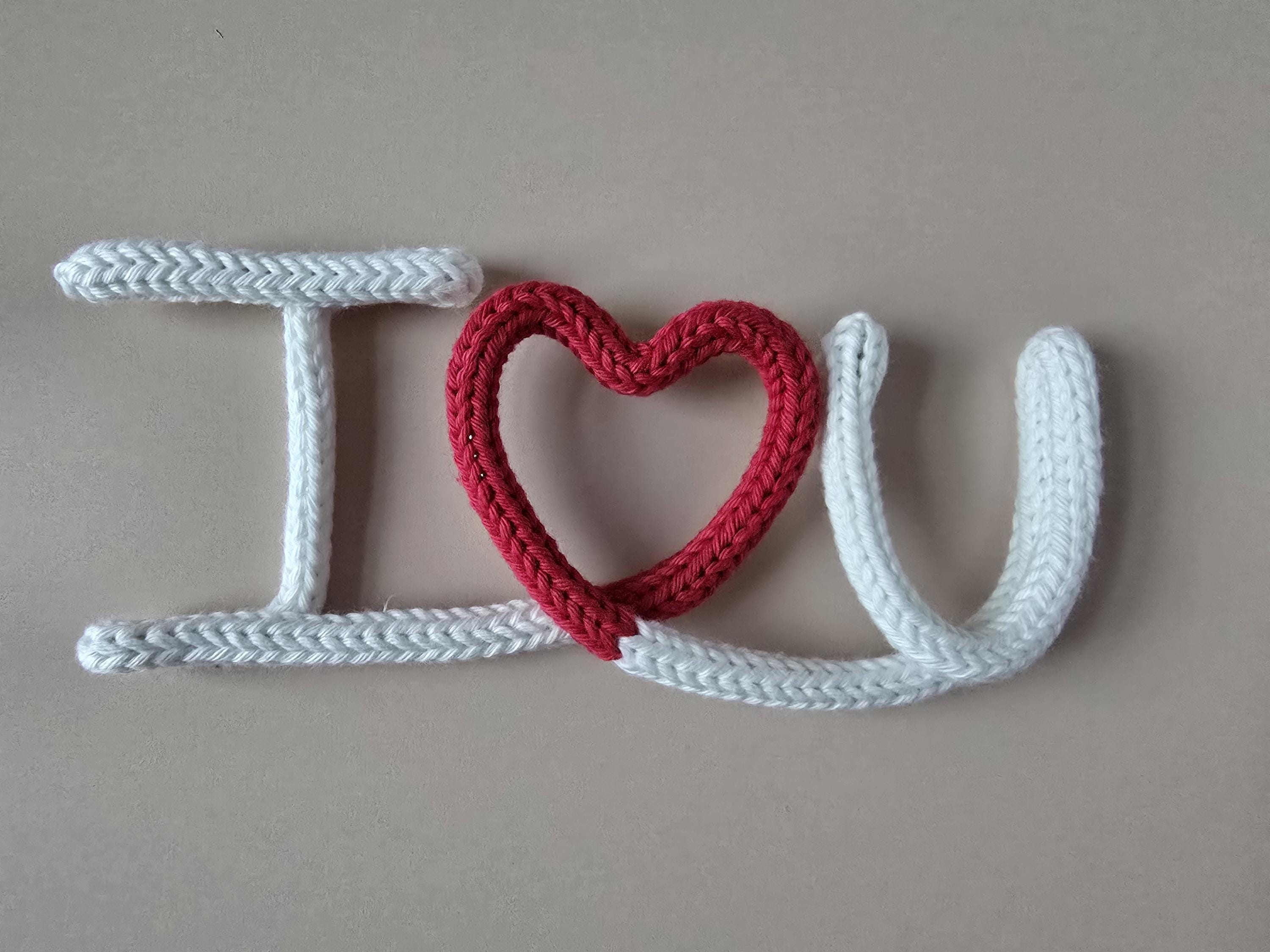 Multi-colour knitted wire I Love You sign with heart in a different colour