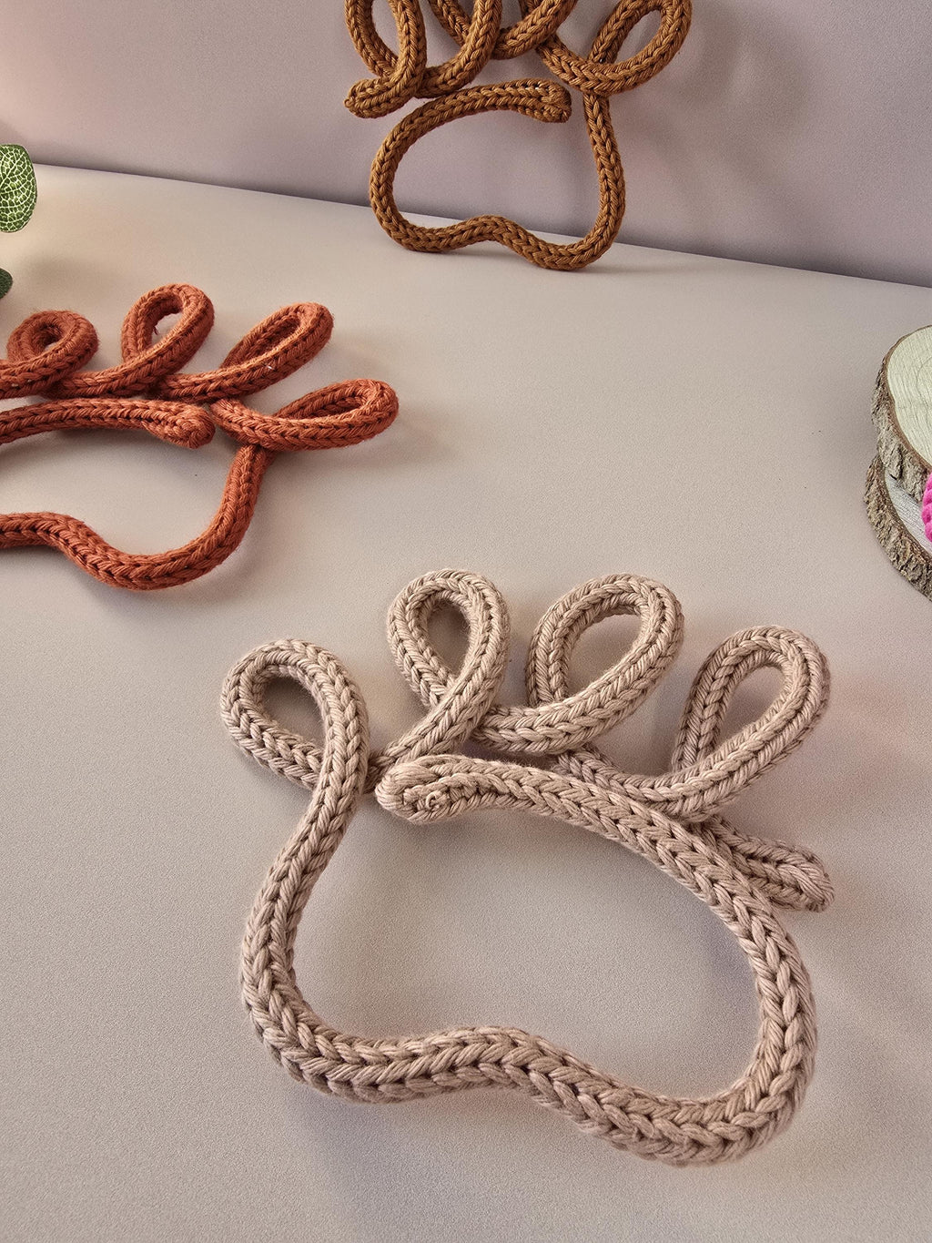 Rust knitted wire dog paw decor for dog lovers