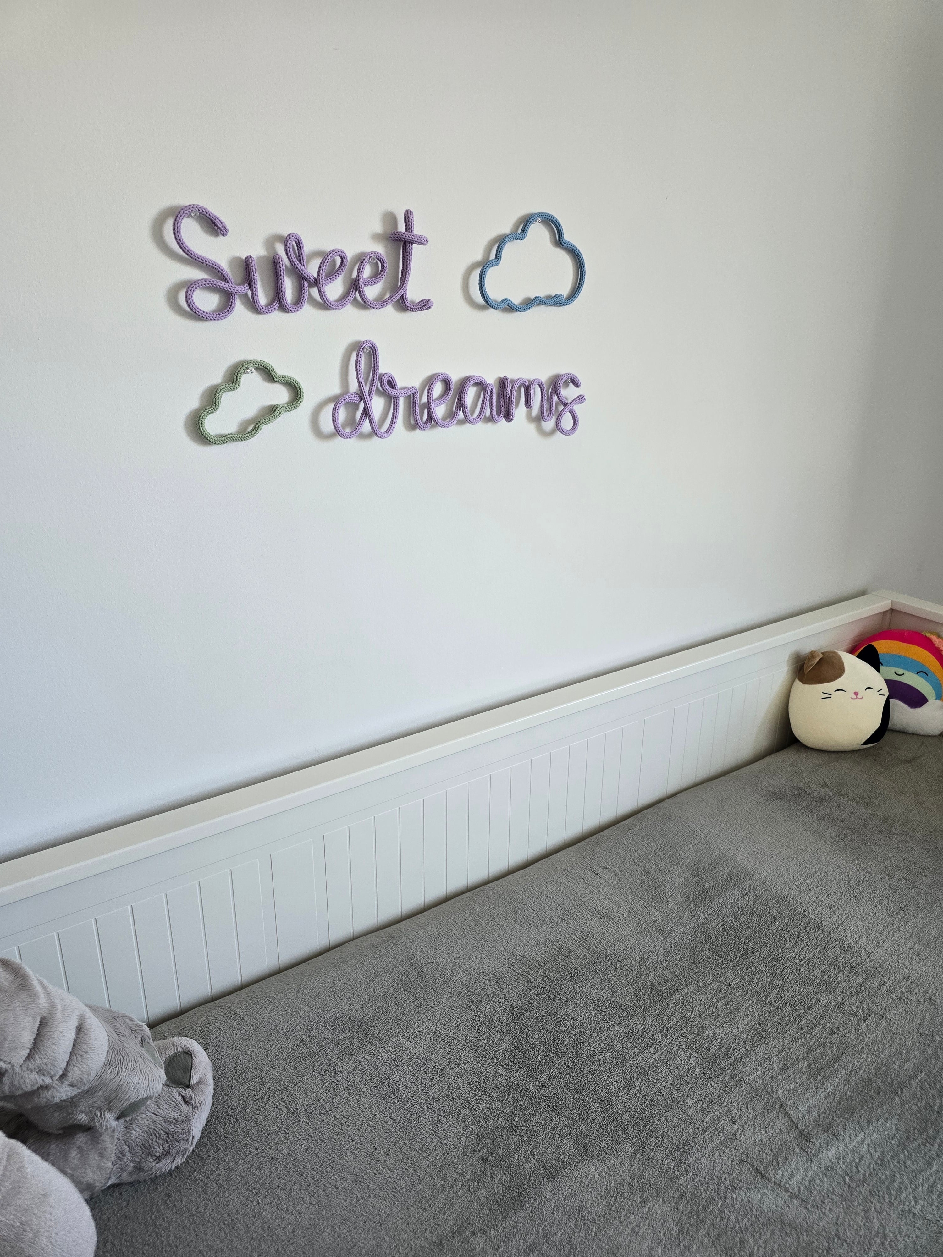 Sweet dreams knitted wire wall decor in a nursery