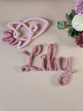 Close-up of soft velvet knitted wire name sign texture