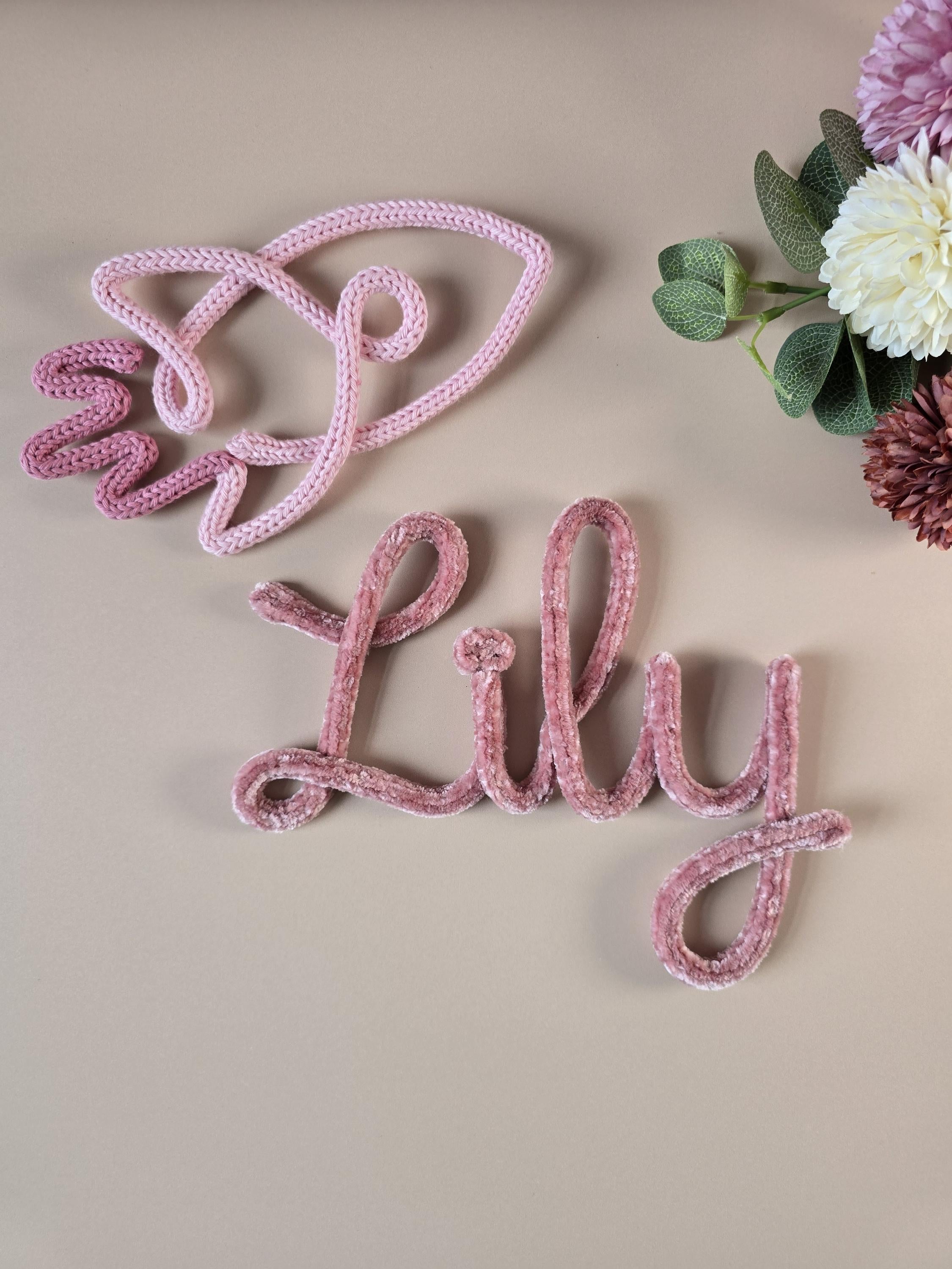 Close-up of soft velvet knitted wire name sign texture