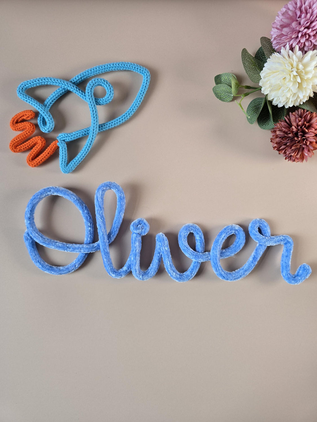 Personalised velvet name signs styled with handmade add-on shapes
