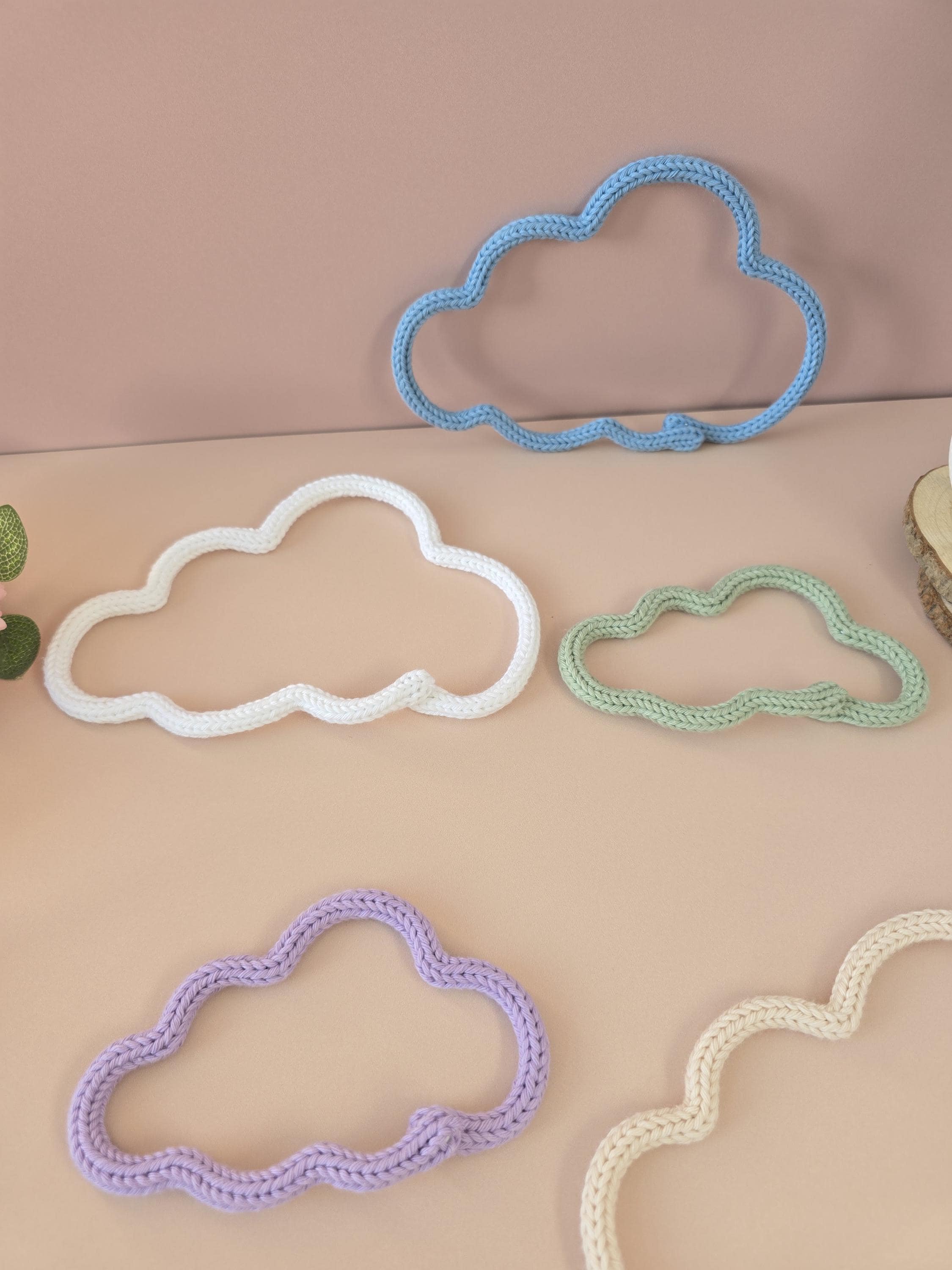 White knitted wire cloud wall decor for nursery or kids room