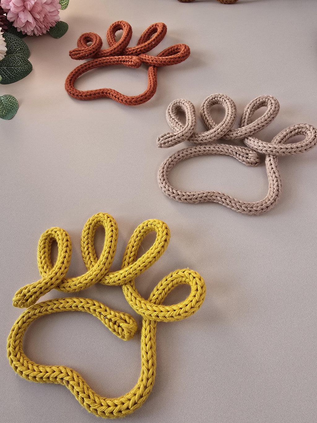 yellow knitted wire dog paw decoration